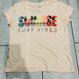 Billabong “Sunrise surf vibes” pink tee.
